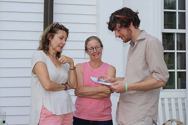 Dana and MaryEllen give Alex a gift from the congregation.